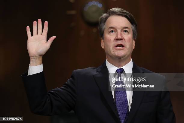 Judge Brett Kavanaugh is sworn in before testifying to the Senate Judiciary Committee during his Supreme Court confirmation hearing in the Dirksen...