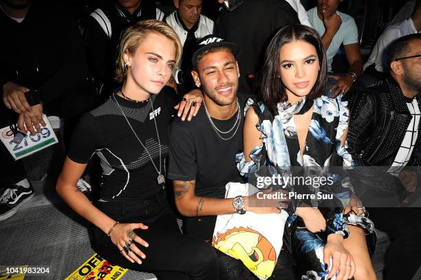 Cara Delevingne, Neymar Jr and Bruna Marquezine attend the Off-White show as part of the Paris Fashion Week Womenswear Spring/Summer 2019 on...