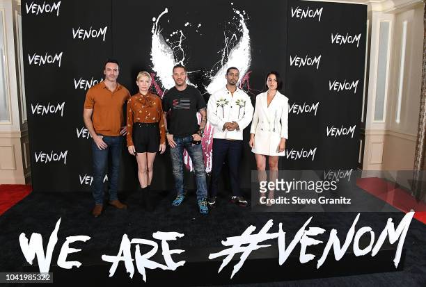 Reid Scott, Michelle Williams, Tom Hardy, Riz Ahmed, and Jenny Slate poses at the Photo Call For Columbia Pictures' "Venom" at Four Seasons Hotel Los...