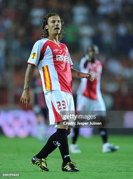 Alexis of Sevilla reacts during the UEFA Europa League group J match between Sevilla and Paris Saint Germain at the Estadio Ramon Sanchez Pizjuan on...