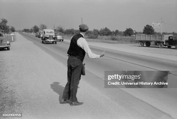 Hitchhiker at City Limits, Waco, Texas, USA, Russell Lee, Farm Security Administration, November 1939.