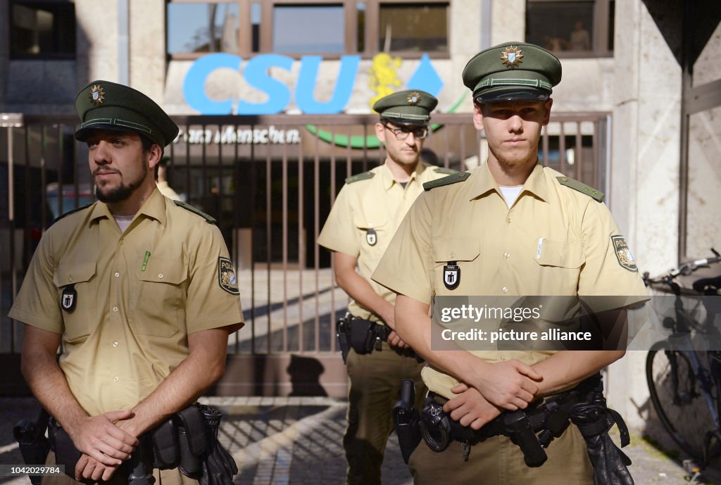 Csu Police Riot Police officers stand in front of the CSU party headquarters in... News ...