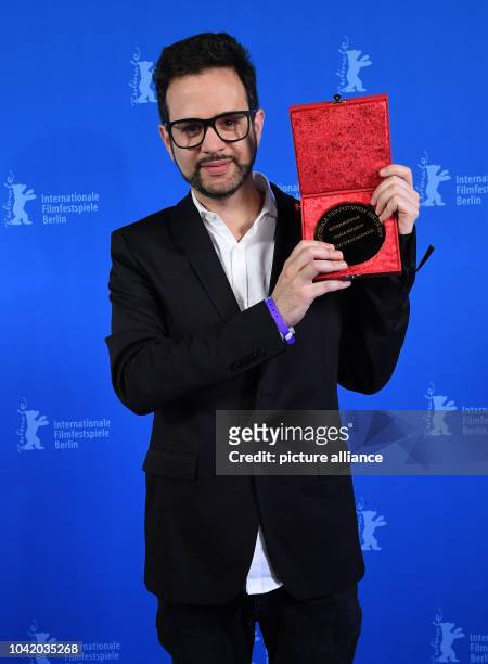 Portuguese director Diogo Costa Amarante receives a Golden Bear at the awards ceremony of the 67th Berlinale Film Festival in Berlin, Germany, 18...