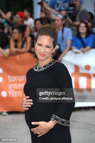 Pregnant US producer Susan Downey attends the premiere of the movie 'The Judge' during the 39th annual Toronto International Film Festival , in...