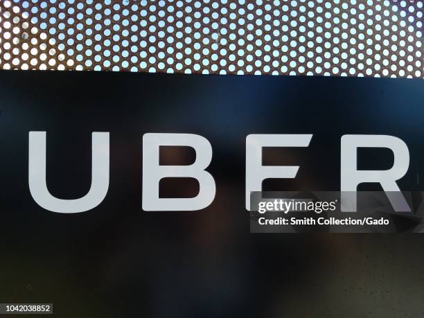 Close-up of logo at Greenlight Hub and inspection center for ridesharing company Uber Inc, a centralized location where new drivers' vehicles are...