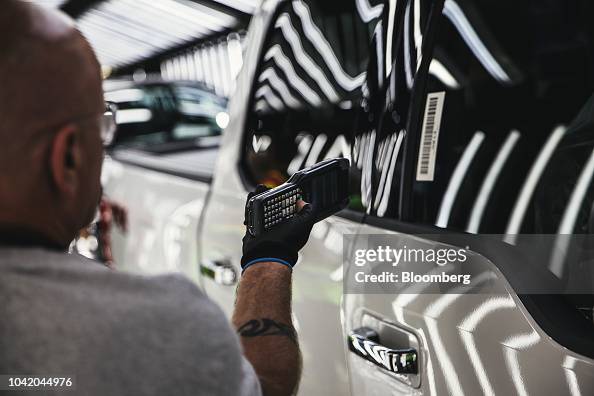 Bar Code Ford An employee scans a barcode on a truck at the Ford Motor Co. Dearborn ...