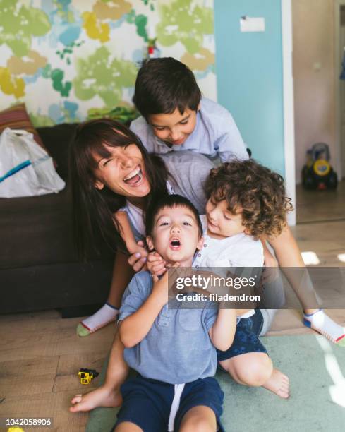 mother with her three little boys - three children only stock pictures, royalty-free photos & images