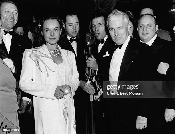 Charlie Chaplin and actress Paulette Goddard at the world premiere of Chaplin's film 'The Great Dictator' at the Capitol Theater, New York, 15th...