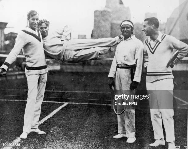 American tennis player Bill Tilden , actors Charlie Chaplin and Douglas Fairbanks Sr , and Spanish tennis player Manuel Alonso share a lighthearted...