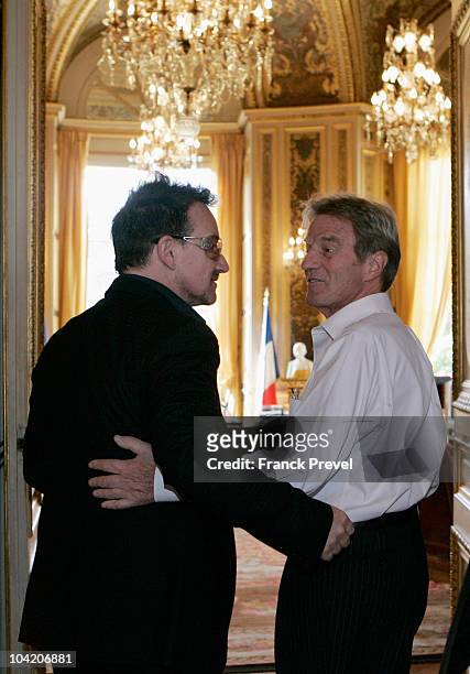 Lead singer Bono of Irish rock band U2 is received by French Foreign Minister Bernard Kouchner at Quai d'Orsay on September 17, 2010 in Paris, France.