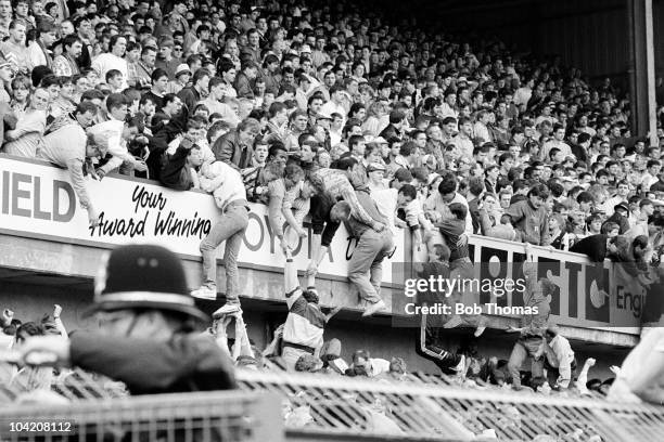 Liverpool fans being pulled from the terraces where they were being crushed during the FA Cup Semi-Final match between Liverpool and Nottingham...