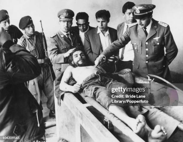 On the day following his execution, the body of Argentinian Communist revolutionary leader Ernesto 'Che' Guevara is put on display in the laundry...