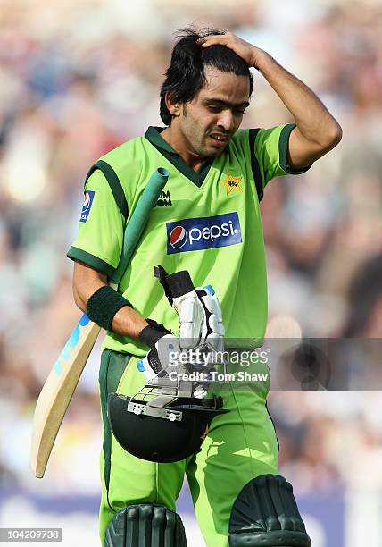 Fawad Alam of Pakistan walks back after being dismissed by Michael Yardy of England during the 3rd NatWest One Day International between England and...