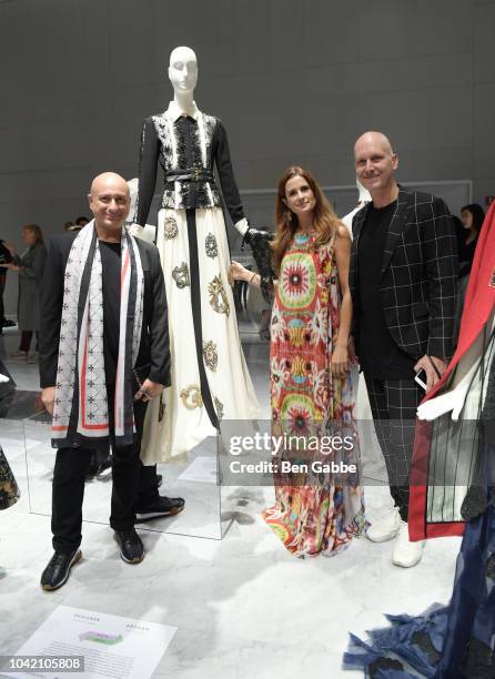 Designer Charles Borg, Founder & Creative Director of Eco-Age Livia Firth and Designer Ron van Maarschalkerweerd attend The Eco-Age Commonwealth...