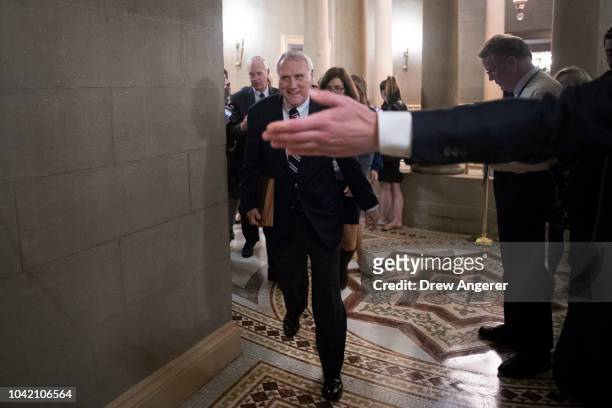 Sen. Jon Kyl arrives at a closed-door GOP caucus meeting following the Senate Judiciary Committee hearing with Dr. Christine Blasey Ford and Supreme...