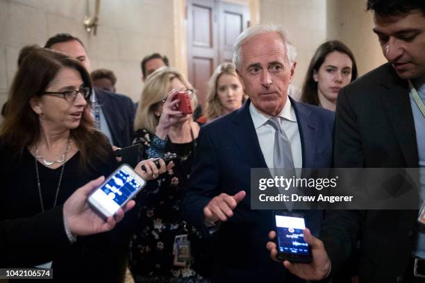 Sen. Bob Corker arrives at a closed-door GOP caucus meeting following the Senate Judiciary Committee hearing with Dr. Christine Blasey Ford and...