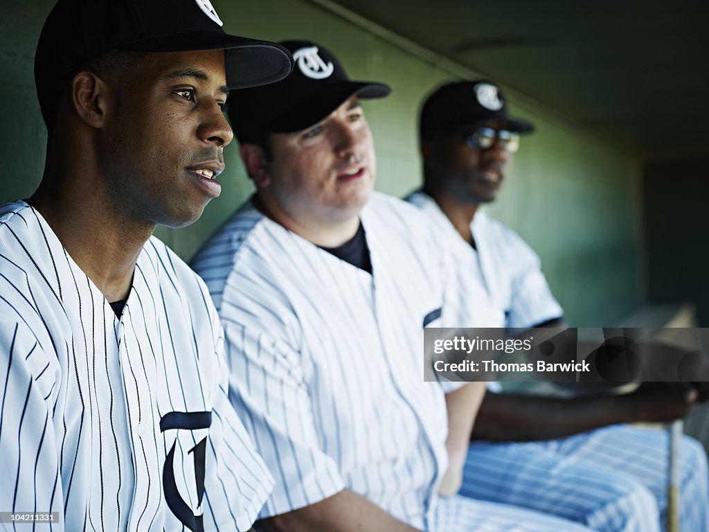 Professional baseball players watching game