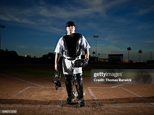 professional baseball catcher at home plate - baseball catcher ストックフォトと画像