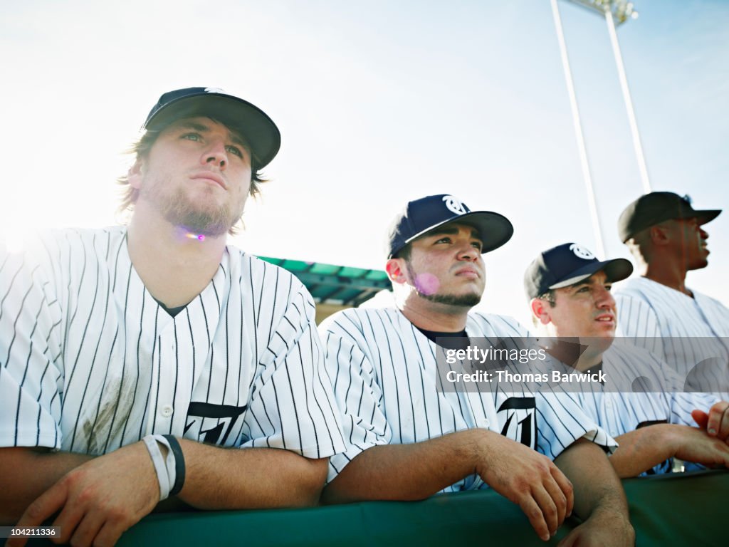 Professional baseball players watching game