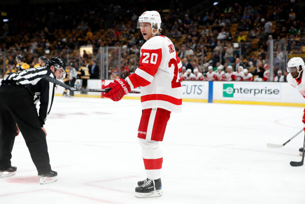 detroit-red-wings-forward-jussi-jokinen-talks-to-his-winger-prior-to-a-face-off-during-a.jpg