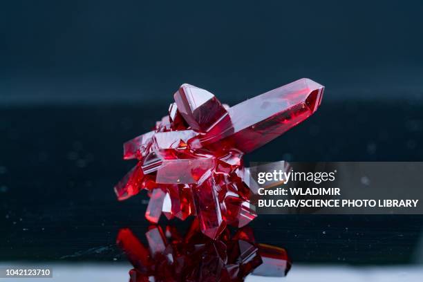 red crystals - raw gems stock pictures, royalty-free photos & images