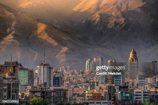 tehran cityscape from tabiat bridge against alborz mountain, iran - iran-skyline foto e immagini stock