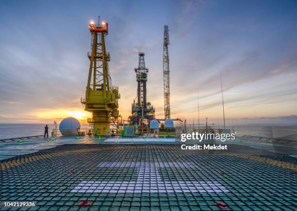 the morning view of oil drilling rig (tender assisted rig type) in gulf of thailand - barge stock pictures, royalty-free photos & images