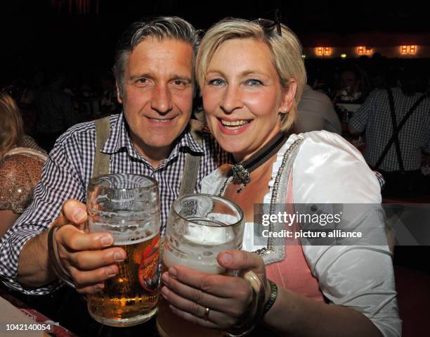 Singer Claudia Jung and her husband Hans Singer pose at the Wiesn Warm Up Party for Oktoberfest from PR lady Birgitt Wolff and caterer Sepp Kraetz in...