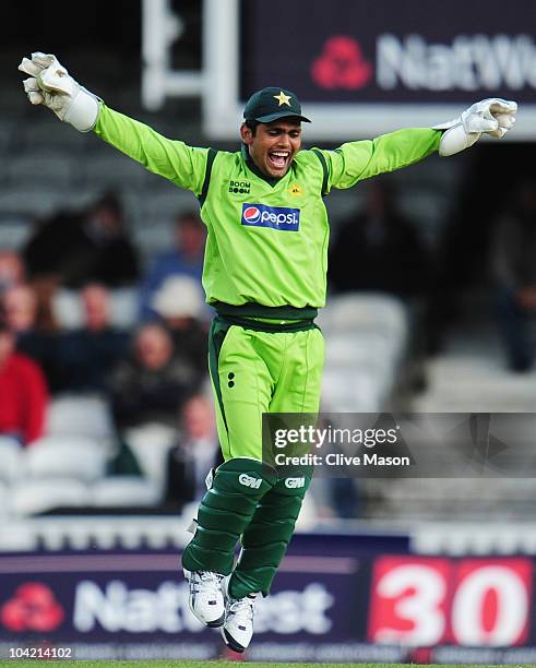 Kamran Akmal of Pakistan celebrates the catch to dismiss Ravi Bopara of England during the 3rd NatWest One Day International between England and...