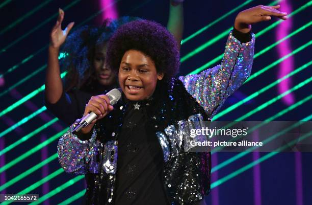 Singer Noah Schaerer performs on stage during the first live show of the 14th season of the talent show 'Deutschland sucht den Superstar' by...