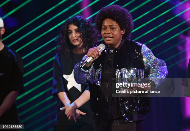 Singer Noah Schaerer seen on stage during the first live show of the 14th season of the talent show 'Deutschland sucht den Superstar' by television...