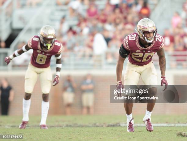 Florida State Seminoles defensive back Jaiden Woodbey lines up as Florida State Seminoles defensive back Stanford Samuels III calls out a play during...