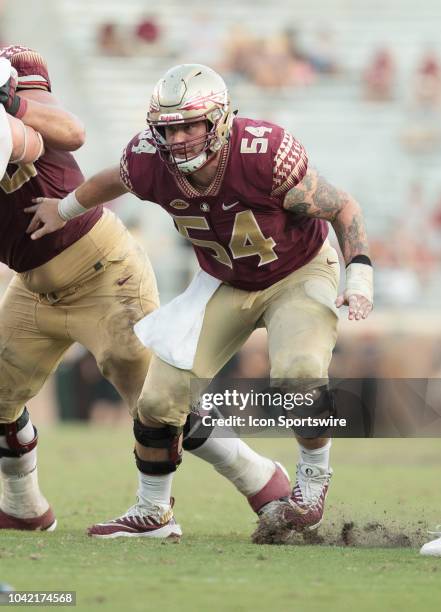 Florida State Seminoles offensive lineman Alec Eberle gets into position during the game between the Florida State Seminoles and the Northern...