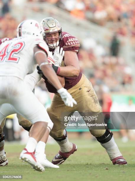 Florida State Seminoles offensive lineman Cole Minshew blocking during the game between the Florida State Seminoles and the Northern Illinois Huskies...