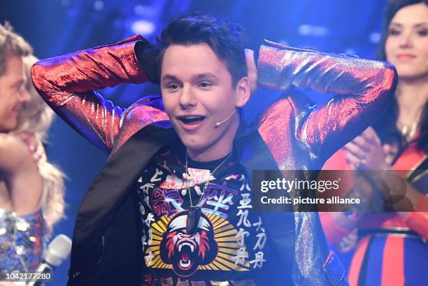 Singer Sandro Brehorst seen on stage during the first live show of the 14th season of the talent show 'Deutschland sucht den Superstar' by television...