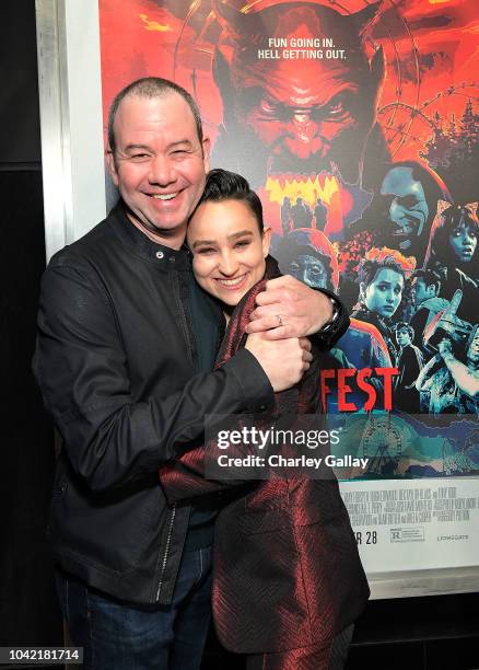 Bex Taylor-Klaus and director Gregory Plotkin attend the Opening Night Screening Of HELL FEST at the TCL Chinese 6 Theater on September 27, 2018 in...