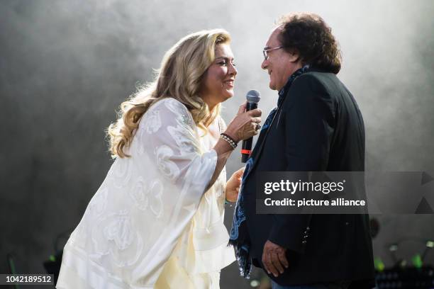 Singing duo Romina Power and Albano Carrisi perform on stage during a concert in Berlin, Germany, 21 August 2015. The concert is their first in the...