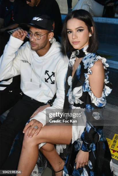 Footballer Neymar Jr and Bruna Marquezine attend the Off White show as part of Paris Fashion Week Womenswear Spring/Summer 2019 on September 27, 2018...