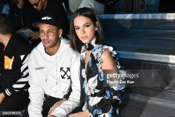 Footballer Neymar Jr and Bruna Marquezinee attend the Off White show as part of Paris Fashion Week Womenswear Spring/Summer 2019 on September 27,...