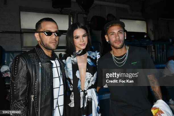 Footballers Daniel Alves , Neymar Jr. , and Bruna Marquezine attend the Off White show as part of Paris Fashion Week Womenswear Spring/Summer 2019 on...