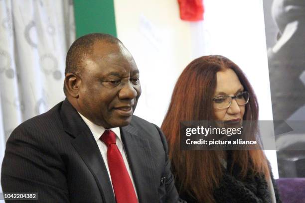 South African Vice President Cyril Ramaphosa with the care mother of the dead Nkosi Johnson, Gail Johnson, during a visit to the orphanage Nkosi's...