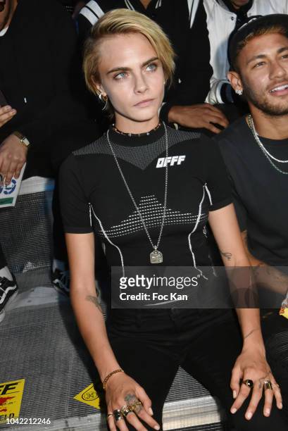 Actress Cara Delevingne and footballer Neymar Jr, attend the Off White show as part of Paris Fashion Week Womenswear Spring/Summer 2019 on September...