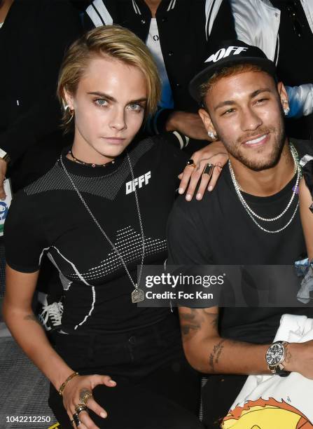 Actress Cara Delevingne and footballer Neymar Jr, attend the Off White show as part of Paris Fashion Week Womenswear Spring/Summer 2019 on September...