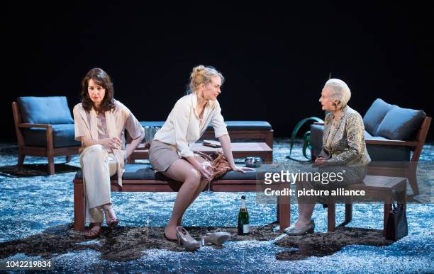 Stephanie Eidt , Nina Hoss and Lore Stefanek perform on stage during the photo rehearsal of the play 'Bella Figura' in the theatre at the Lehniner...
