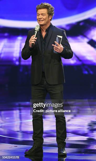 Television presenter Oliver Geissen seen during the first live show of the 14th season of the talent show 'Deutschland sucht den Superstar' by...