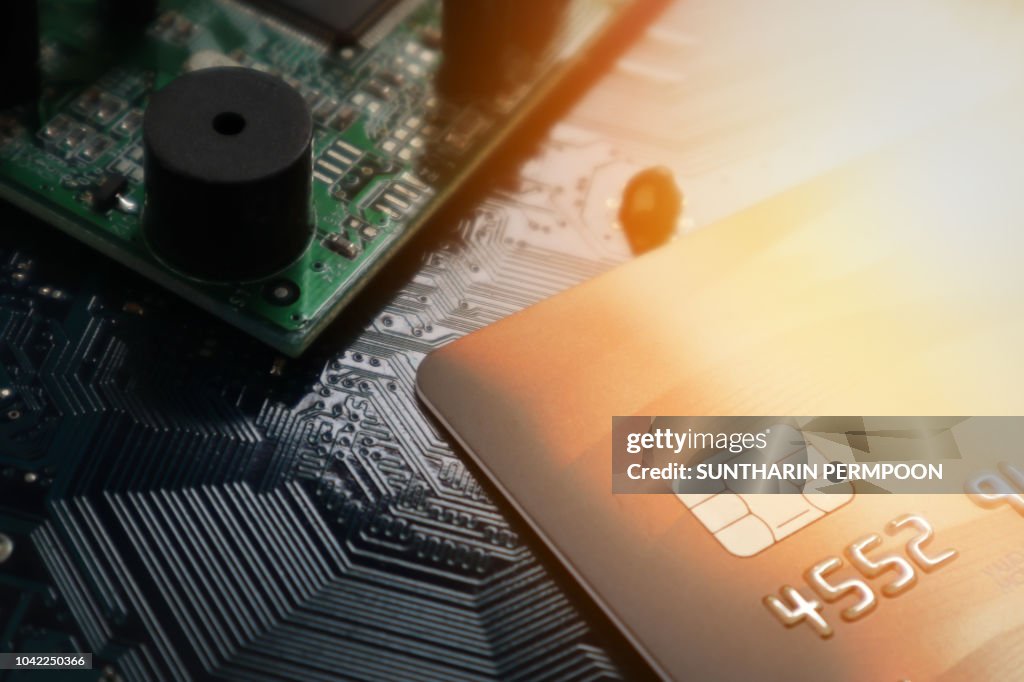 Credit Card On Circuit Mainboard Of Computer Financial And Technology ...