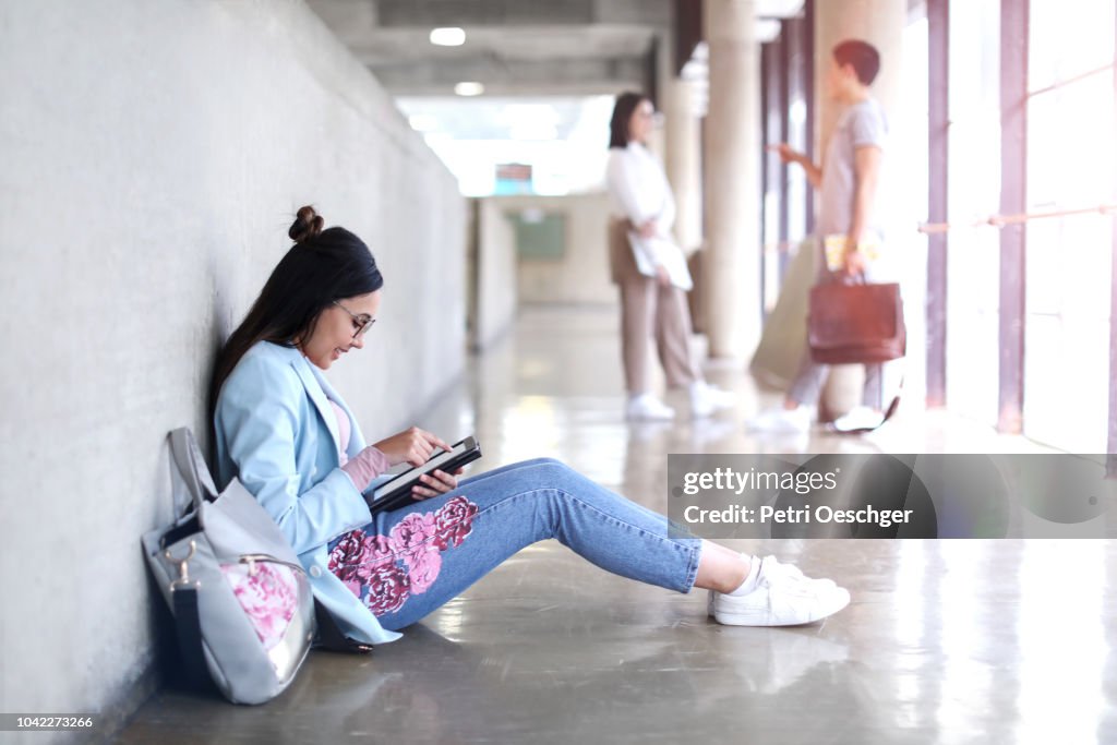Break Between Class University Students Having A Break Between Classes High-Res Stock Photo ...