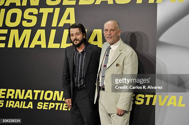 Actors Diego Luna and John Malkovich attend the 58th San Sebastian International Film Festival Opening Ceremony at the Kursaal Palace on September...