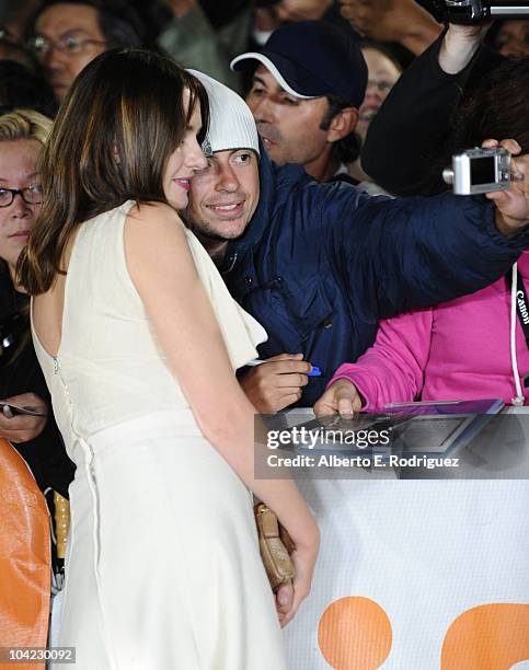 Actress Emily Mortimer poses for a photo with a fan as she attends "Janie Jones" Premiere during the 35th Toronto International Film Festivalat Roy...