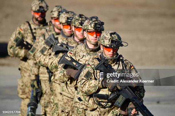 Armoured infantryman of the Bundeswehr, the German armed forces, demonstrate their skills during a three-day Bundeswehr exercise on September 28,...